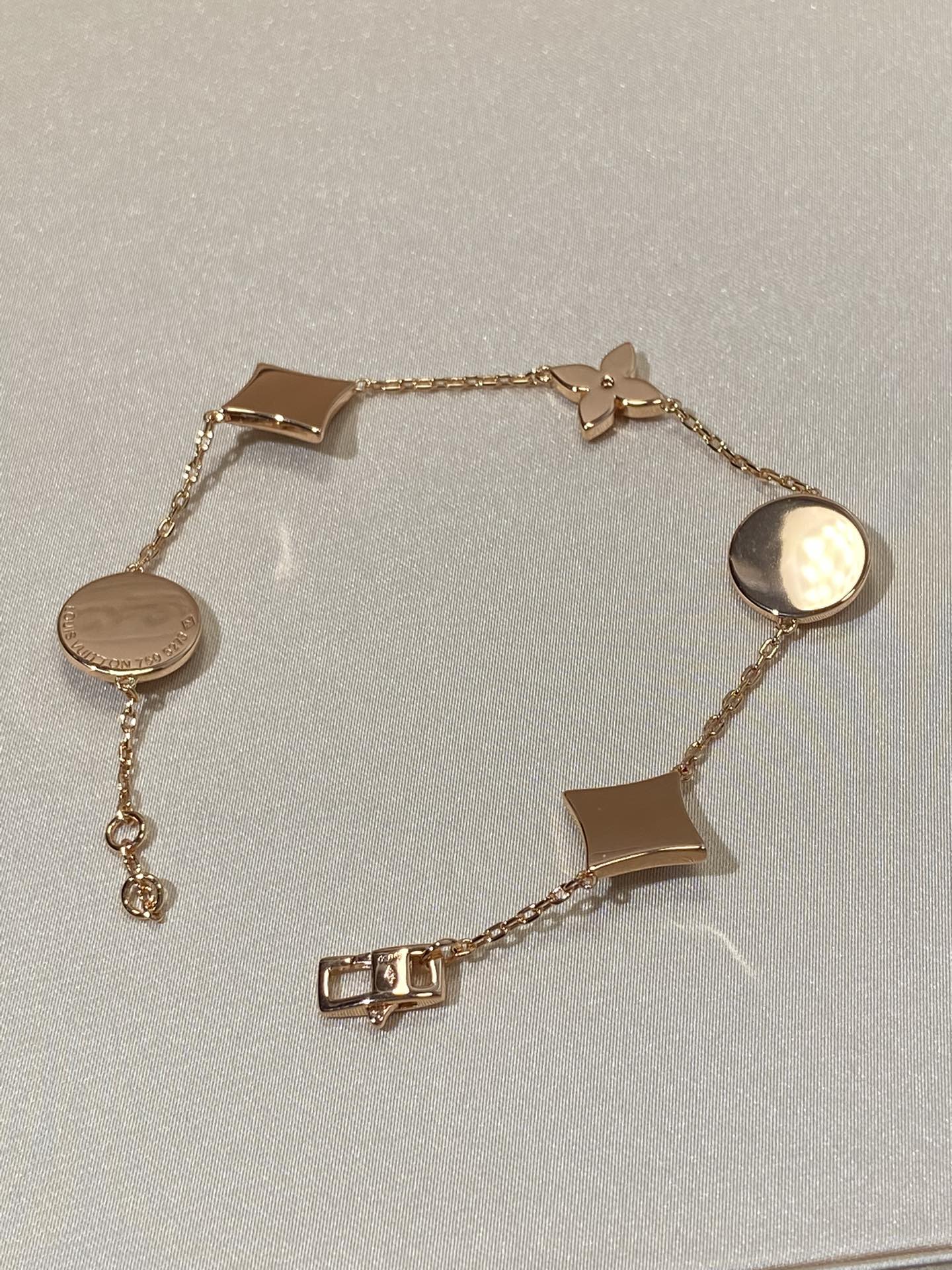 [Triumph Jewelry]STAR AND SUN 5 MOTIF MOP PINK GOLD BRACELET